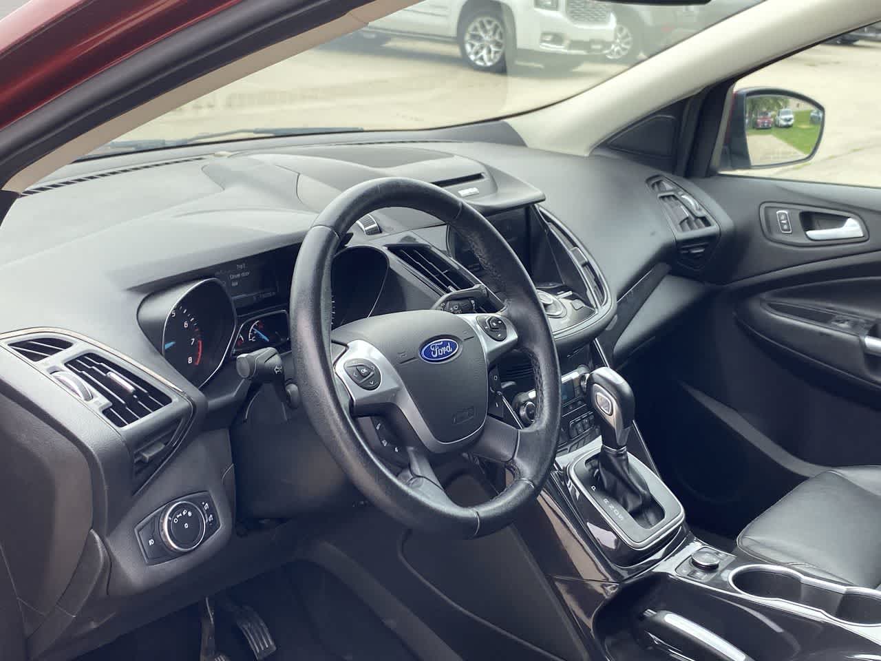 Used 2014 Ford Escape Titanium with VIN 1FMCU9J90EUA75909 for sale in Urbandale, IA