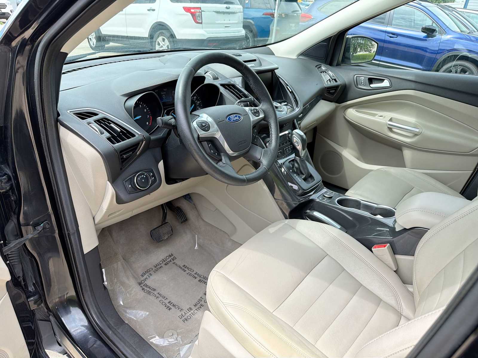 Used 2014 Ford Escape Titanium with VIN 1FMCU9J91EUD78035 for sale in Urbandale, IA