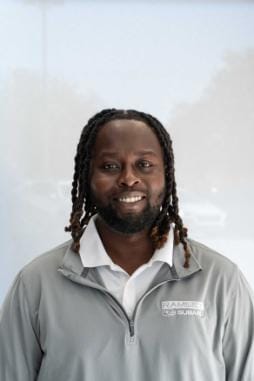 Staff member Djala Toure from ID_6e49ff