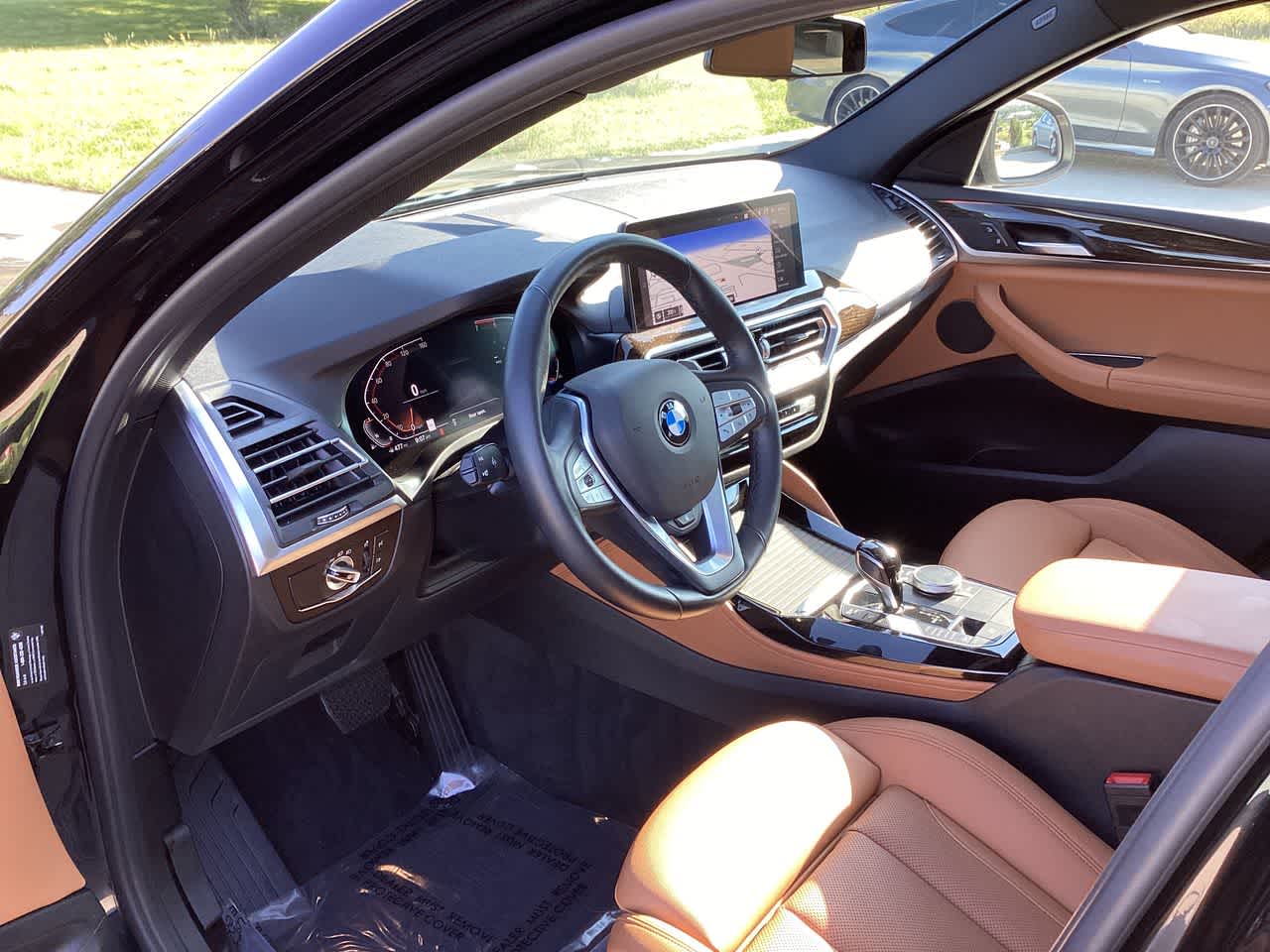 Used 2022 BMW X4 30i with VIN 5UX33DT06N9K46317 for sale in Urbandale, IA