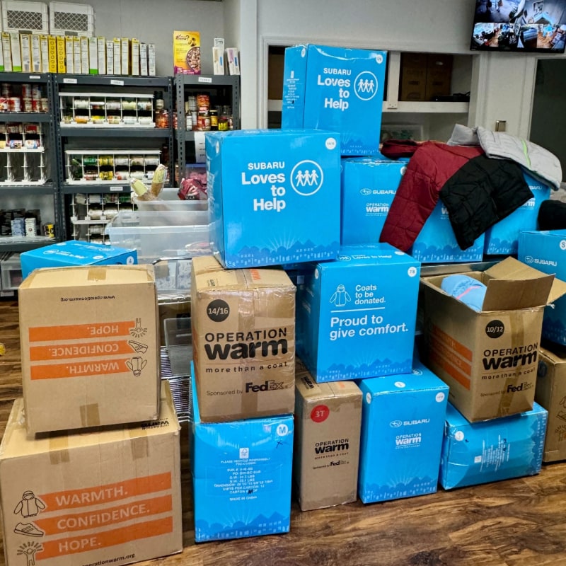 Boxes of coats for Ramsey Subaru's Operation Warm Community Event