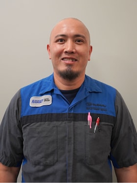 Staff member Pastor Culala from ID_0290720ce013