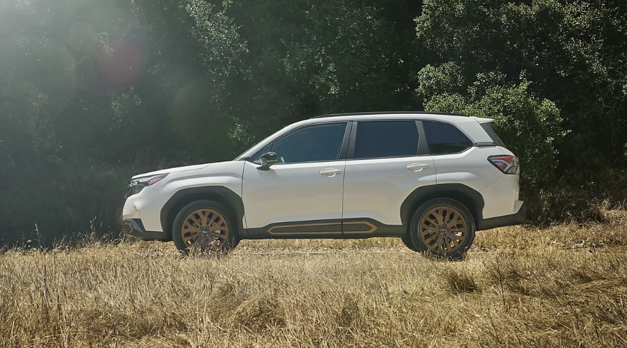 Front angle view of a 2026 Subaru Forester showcasing its standard 8.7 inches of high ground clearance over obstacles