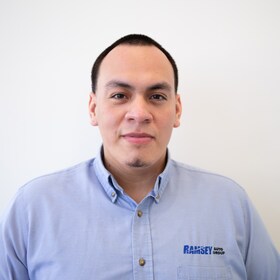 Staff member Bryan Ruesta from ID_896062