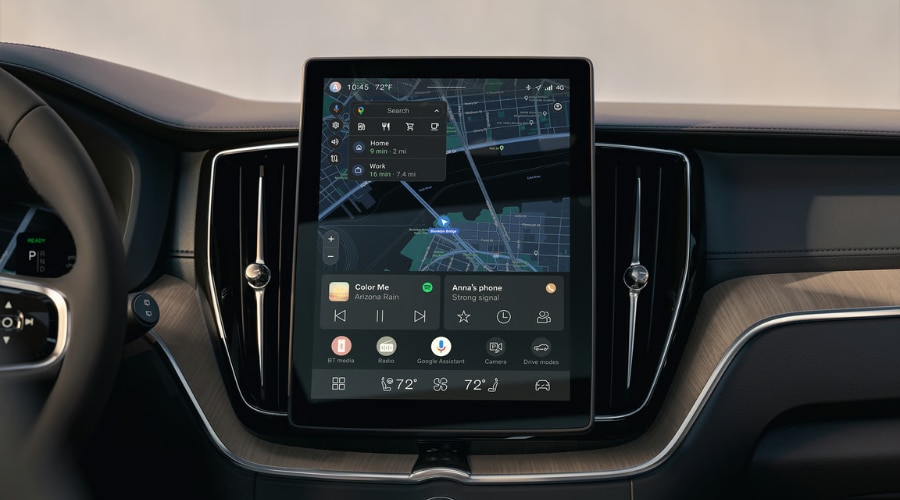 Interior dashboard view of a 2026 Volvo XC60 T8 Plug-In Hybrid showing the new larger 11.2 inch Google infotainment touchscreen