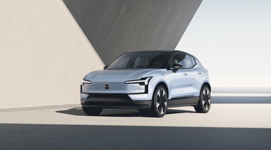 2026 Volvo EX30 and EX90 driving through Ramsey showing the modern electric SUV design and sleek exterior.