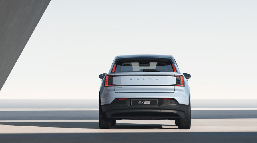 Rear profile of a 2026 Volvo EX30 in Wyckoff showing the sleek LED lighting and compact SUV stance.