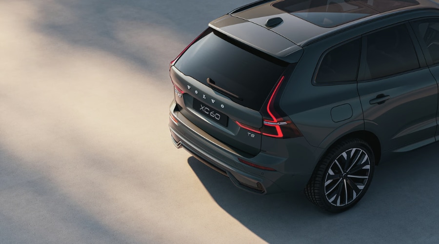 Close up view of the T8 badge on a 2026 Volvo XC60 Plug-In Hybrid in Ramsey highlighting its advanced performance engineering