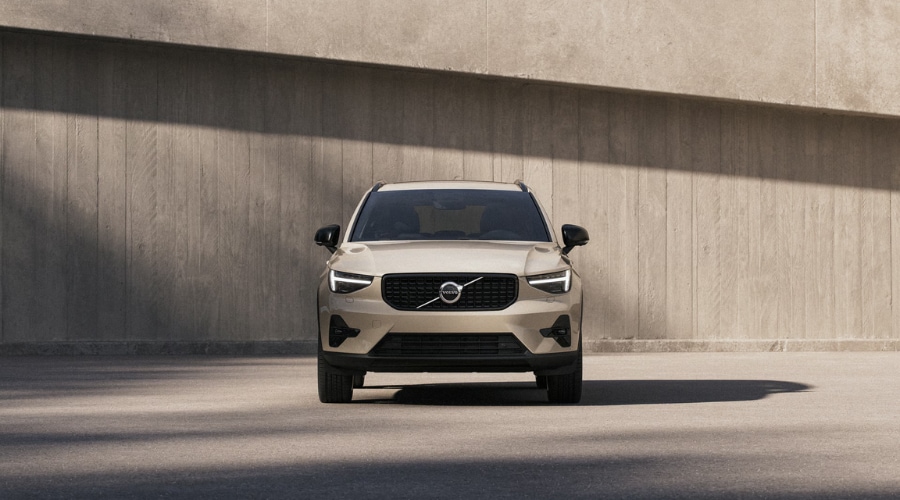Front profile of a 2026 Volvo XC40 compact luxury SUV in Ramsey showing its striking signature Thor Hammer headlights and sleek Scandinavian design