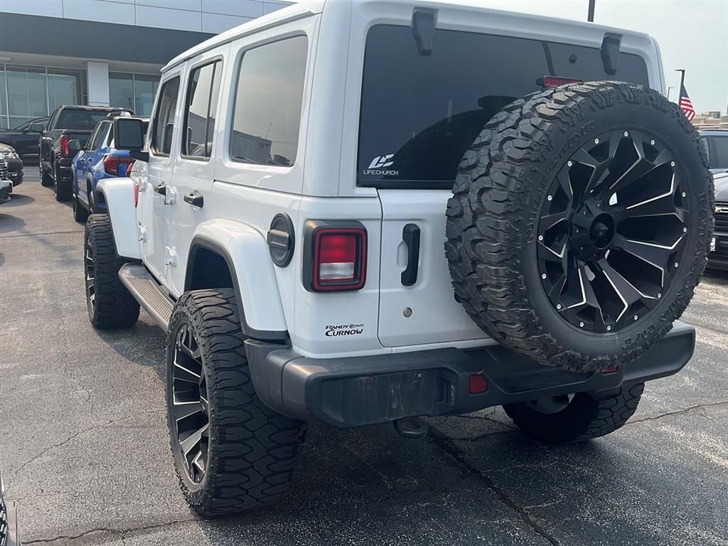Used 2019 Jeep Wrangler Unlimited Sahara with VIN 1C4HJXEG3KW564871 for sale in Kansas City