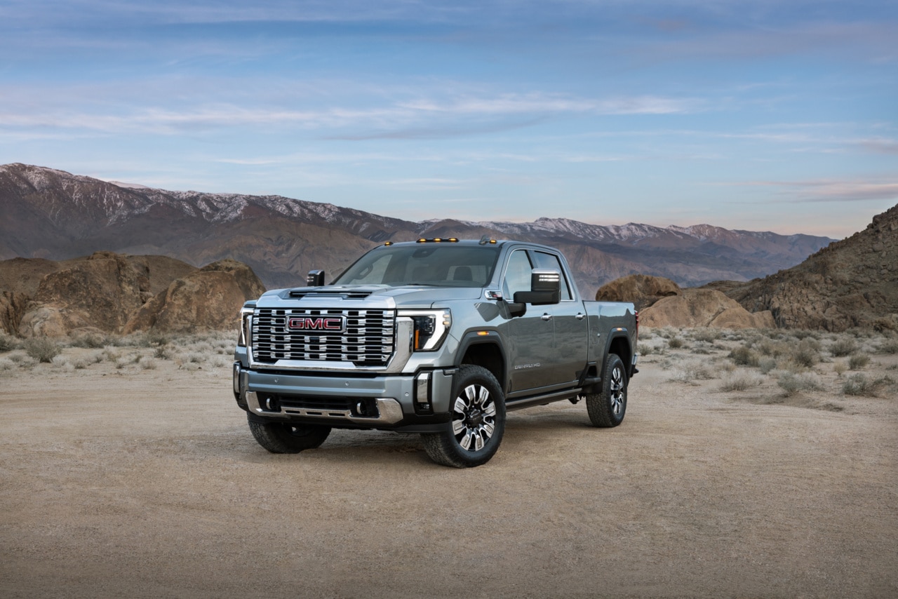 GMC Sierra 2500HD GMC Sierra HD Denali 2500 Pickup Truck Driving on Dirt Road
