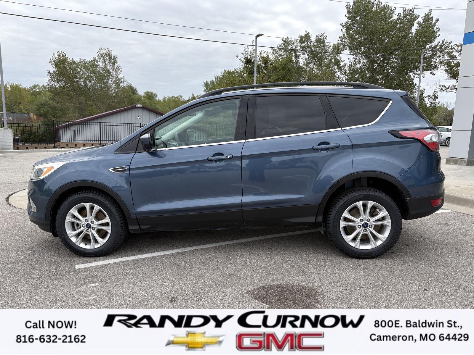 Used 2018 Ford Escape SE with VIN 1FMCU9GD9JUA96974 for sale in Kansas City