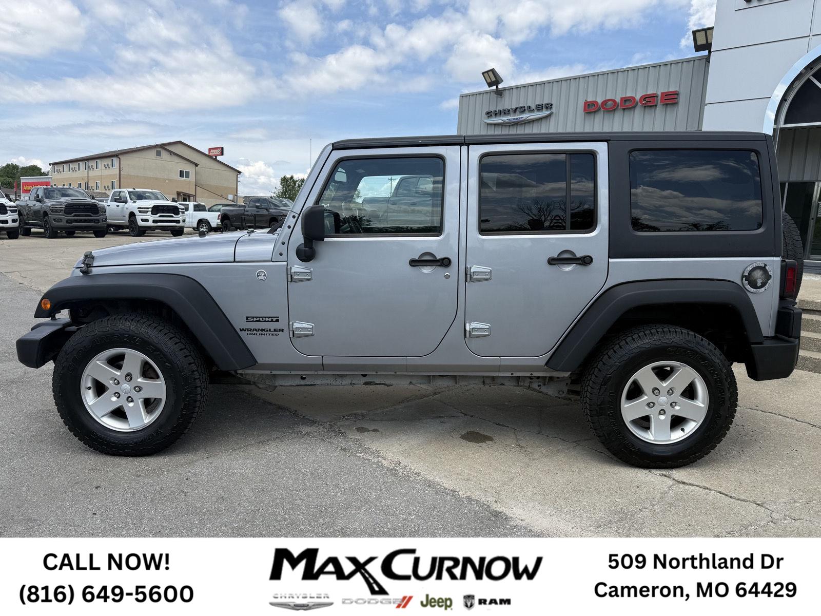 Used 2014 Jeep Wrangler Unlimited Sport with VIN 1C4BJWDG2EL142579 for sale in Kansas City