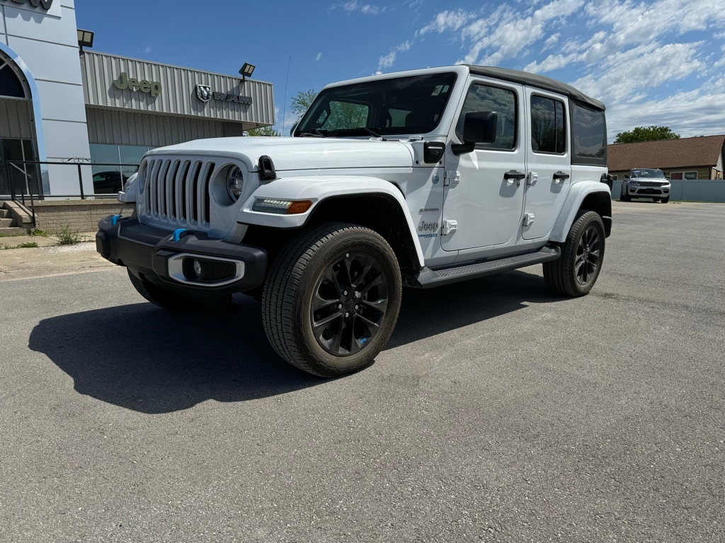 Used 2022 Jeep Wrangler Unlimited Sahara 4XE with VIN 1C4JJXP67NW123528 for sale in Kansas City