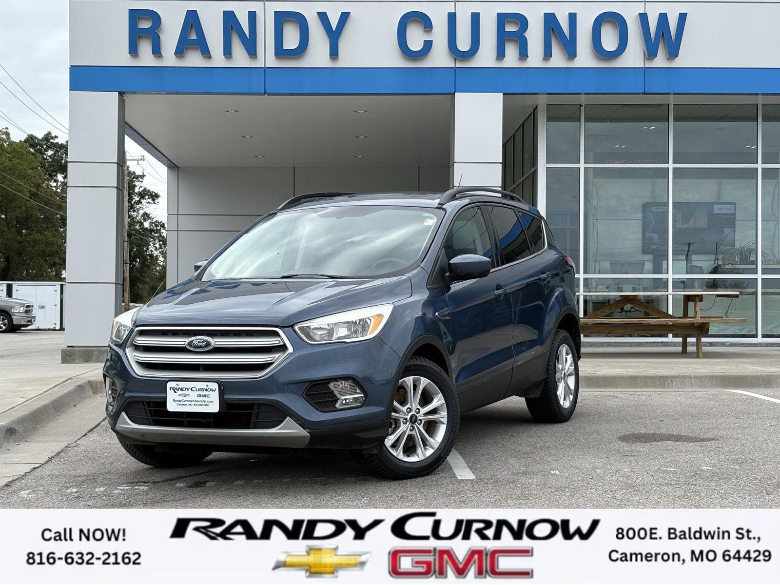 Used 2018 Ford Escape SE with VIN 1FMCU9GD9JUA96974 for sale in Kansas City