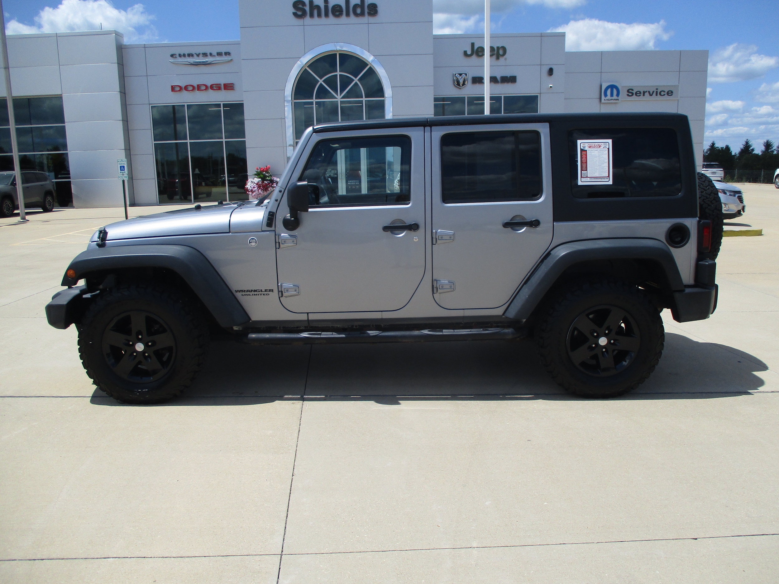 Used 2014 Jeep Wrangler Unlimited Sport with VIN 1C4BJWDG3EL104987 for sale in Rantoul, IL