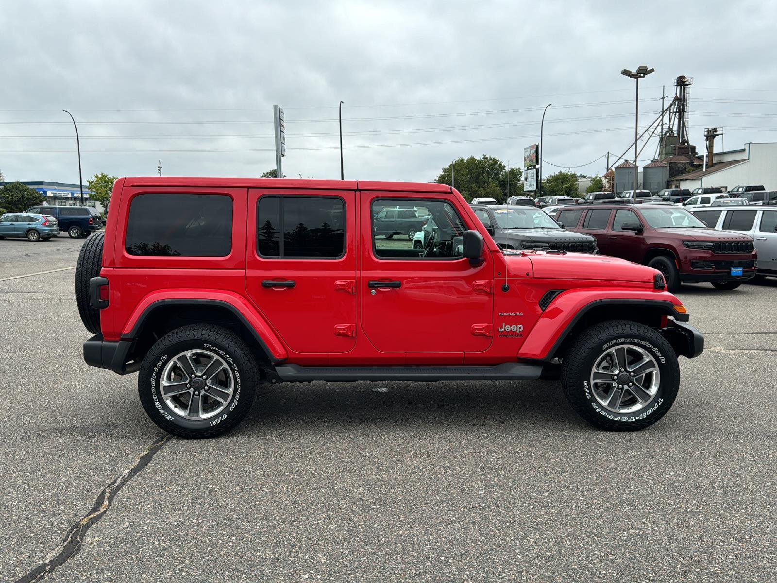 Used 2021 Jeep Wrangler Unlimited Sahara with VIN 1C4HJXEN7MW566267 for sale in Grand Rapids, Minnesota