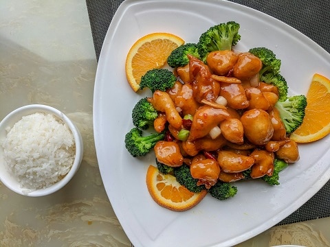 plate of orange chicken at a Chinese restaurant in plano, tx