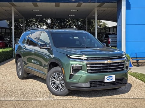 green 2027 Chevrolet Traverse SUV parked at the Huffines Chevrolet Plano dealership in Plano, TX