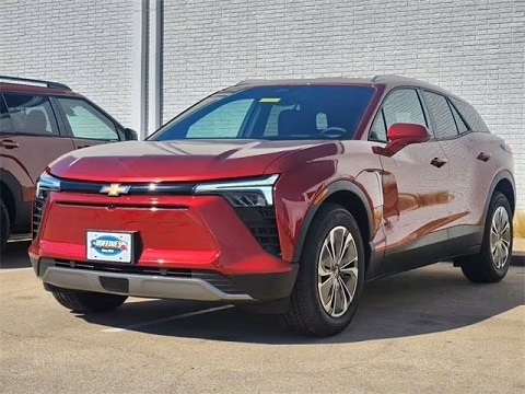 red 2025 Chevrolet Blazer crossover parked at the Huffines Chevrolet Plano dealership in Plano, TX