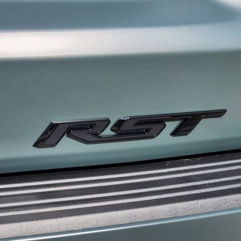 RST trim badge on a 2026 Chevy Suburban parked at the Huffines Chevrolet Plano dealership in Plano, TX