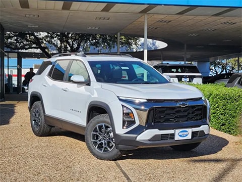 white 2026 Chevrolet Equinox SUV parked at the Huffines Chevrolet Plano dealership in Plano, TX