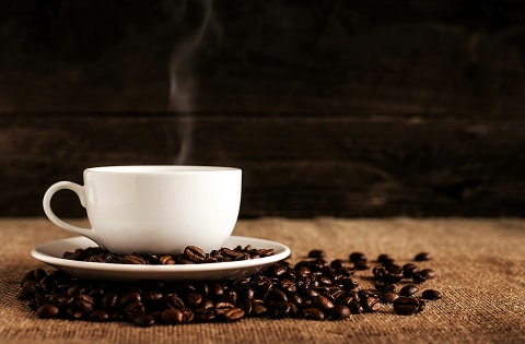 a cup of coffee on a table