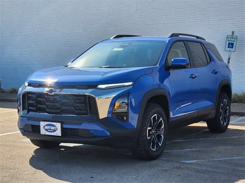 blue 2025 chevy equinox crossover parked at the Huffines Chevrolet Plano dealership in Plano, TX