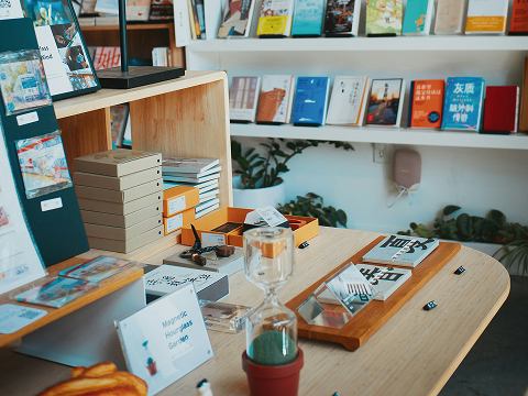 books on a shelf at a book store in Plano, TX