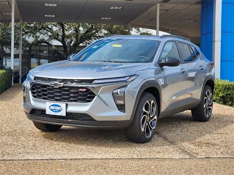 grey 2025 Chevrolet Trax SUV parked outside the Huffines Chevrolet Plano dealership in Plano, TX