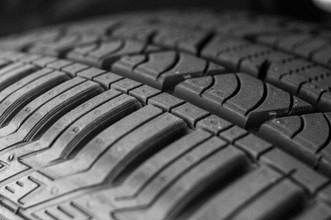 close-up of a tire on a car at the Huffines Chevrolet Plano dealership in Plano, TX