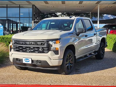 white 2026 Chevy Silverado 1500 parked at the Huffines Chevrolet Plano dealership in Plano, TX
