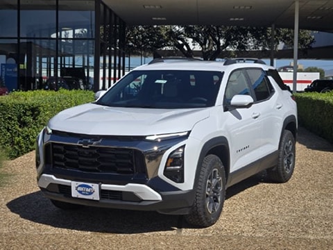 white 2026 Chevrolet Equinox SUV parked at the Huffines Chevrolet Plano dealership in Plano, TX