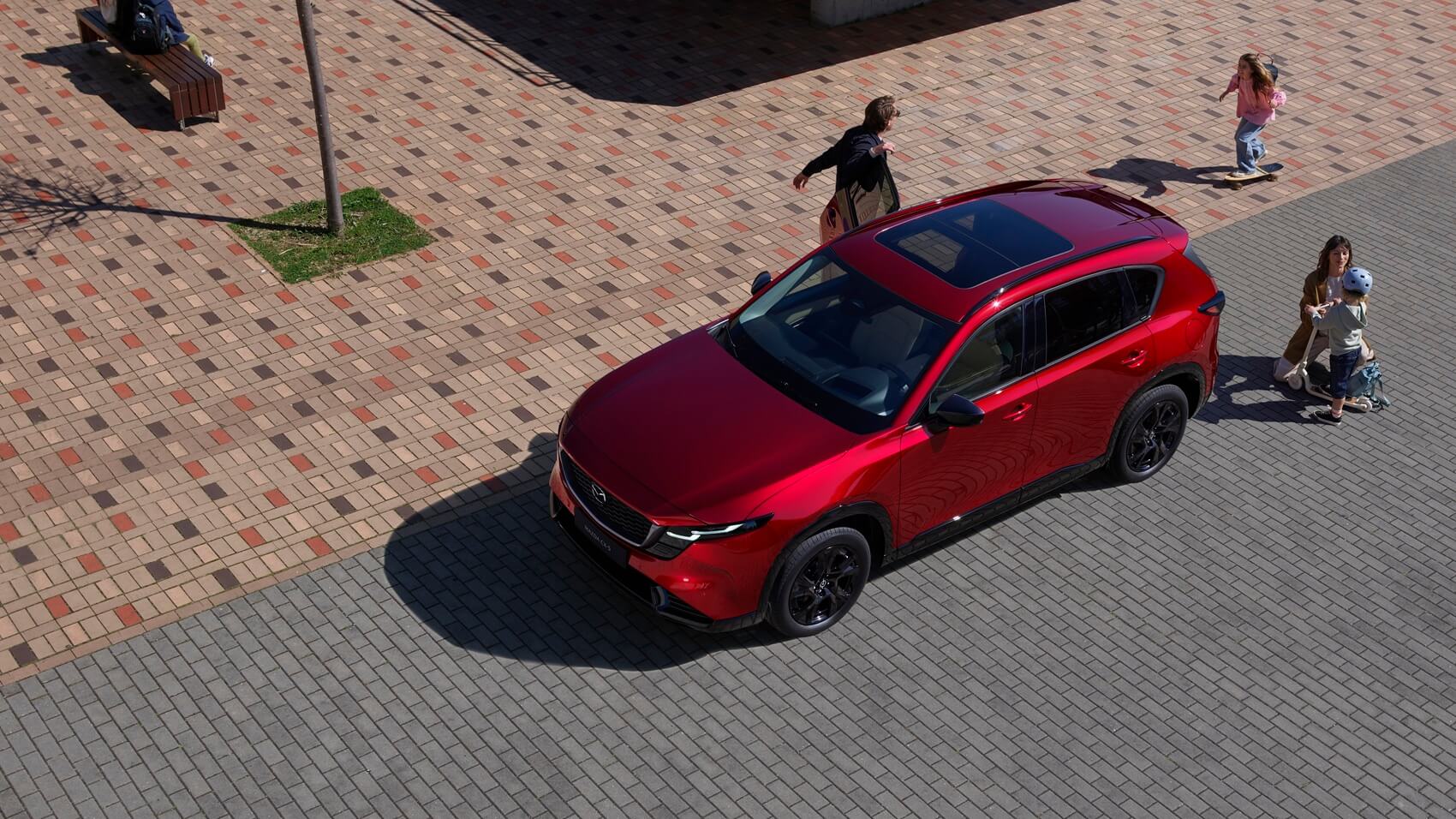 Top view of a red MAZDA CX-5 parked on street