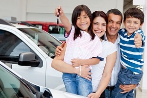 Family Choosing Used Car to Buy