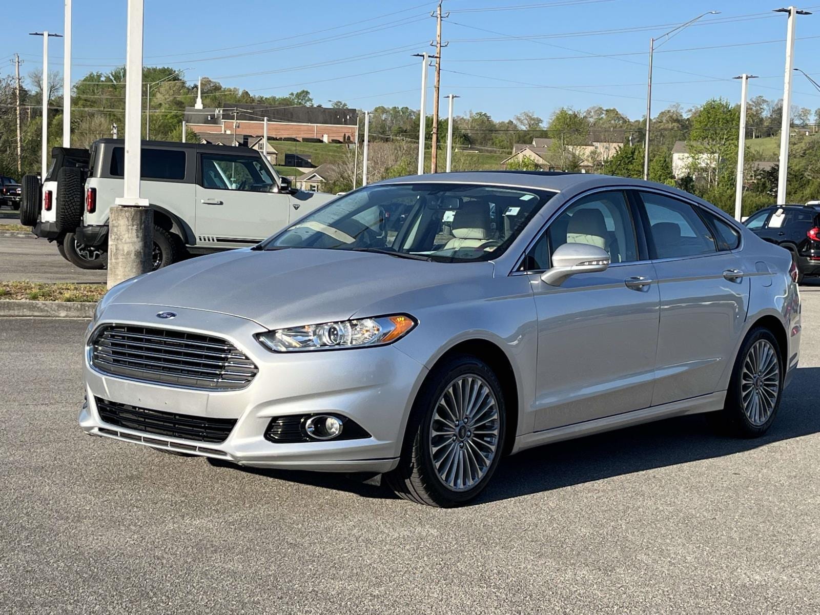 Used 2016 Ford Fusion Titanium with VIN 3FA6P0K98GR361249 for sale in Clinton, TN