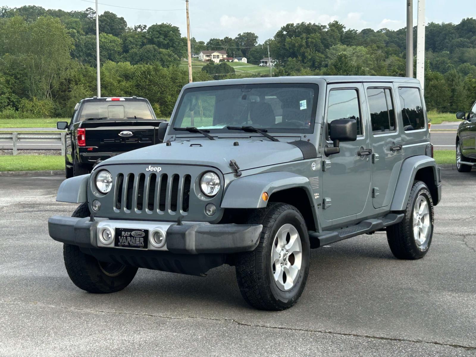 Used 2015 Jeep Wrangler Unlimited Sahara with VIN 1C4BJWEG6FL645483 for sale in Clinton, TN