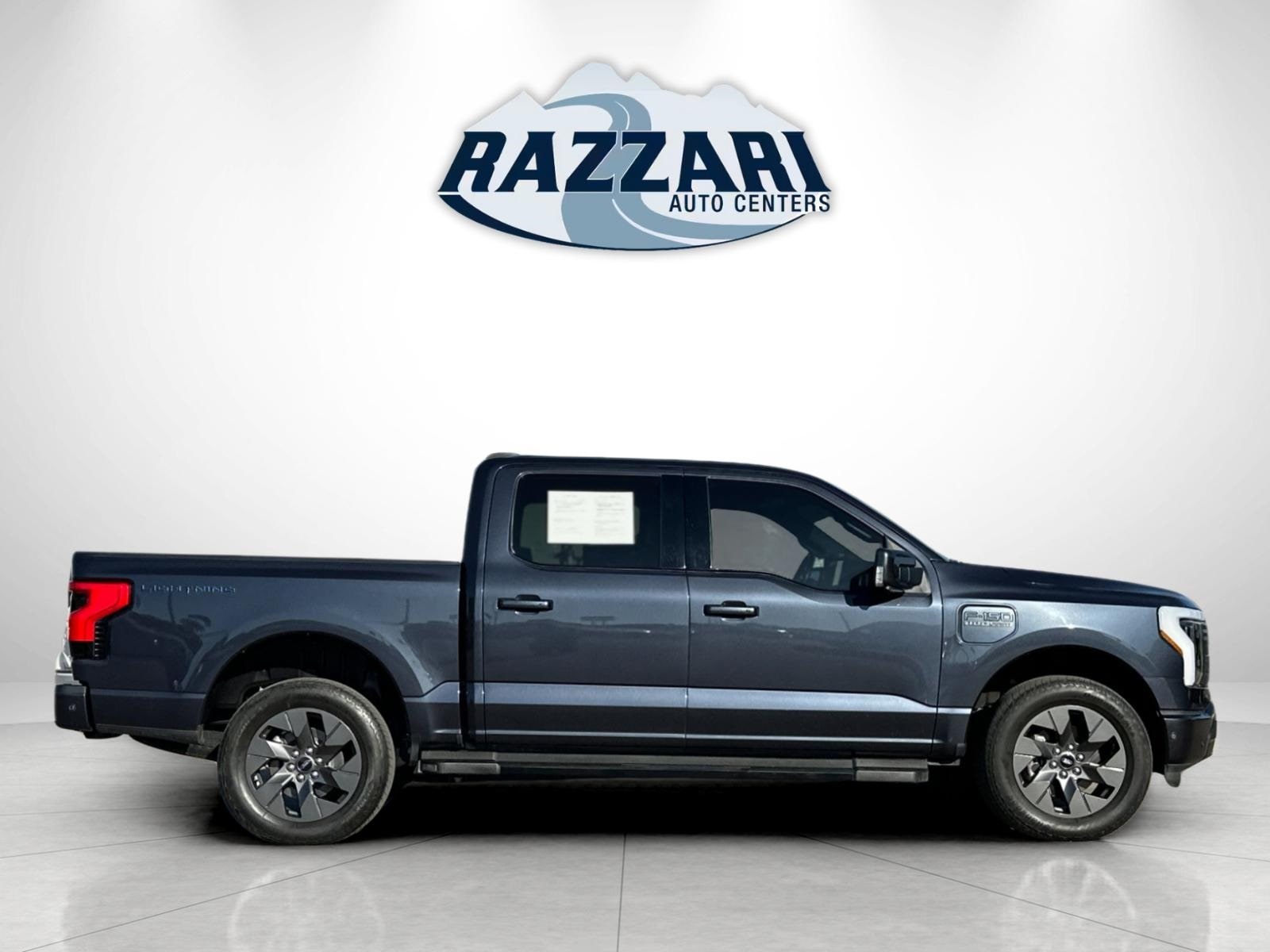 Used 2022 Ford F-150 Lightning Lariat with VIN 1FTVW1EV0NWG03601 for sale in Merced, CA
