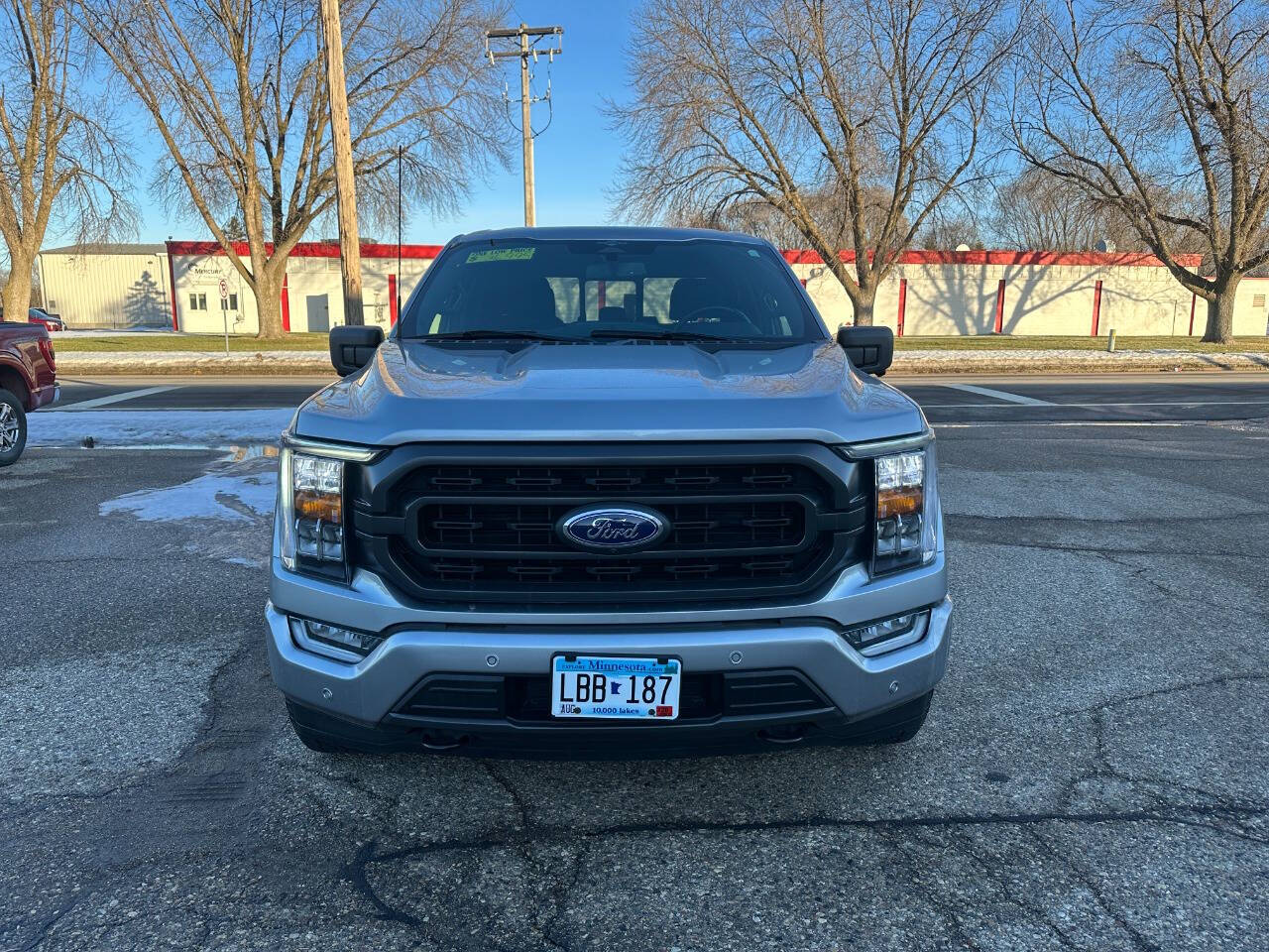 Used 2023 Ford F-150 XLT with VIN 1FTFW1ED9PFA69464 for sale in Faribault, Minnesota