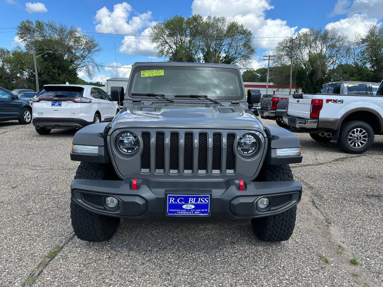 Used 2022 Jeep Wrangler Unlimited Rubicon with VIN 1C4HJXFG1NW239381 for sale in Faribault, Minnesota