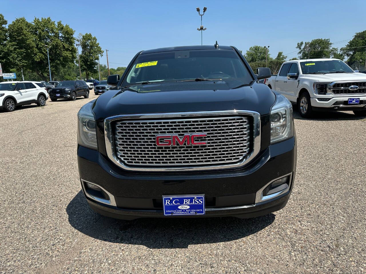 Used 2015 GMC Yukon Denali with VIN 1GKS2CKJXFR731716 for sale in Faribault, Minnesota