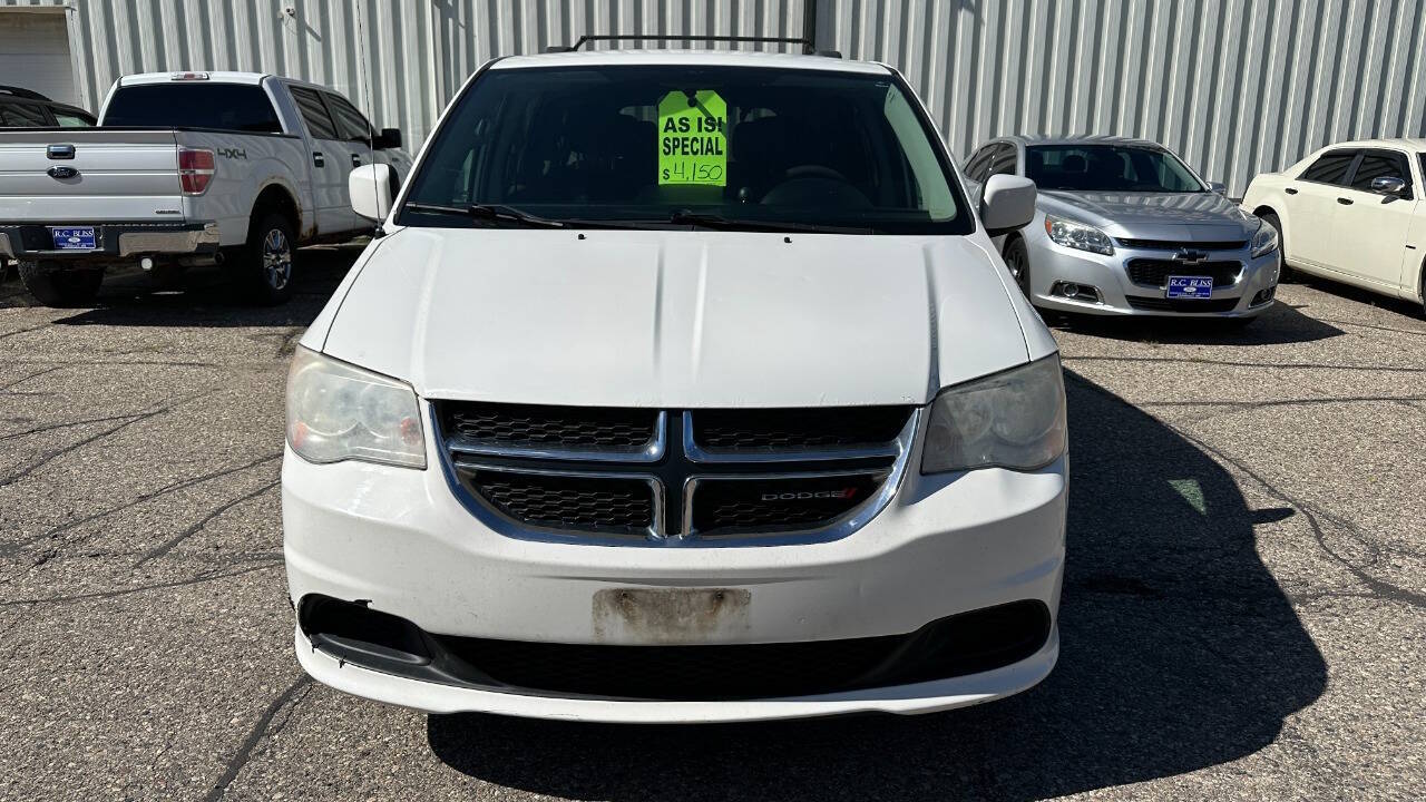 Used 2013 Dodge Grand Caravan SXT with VIN 2C4RDGCGXDR637485 for sale in Faribault, Minnesota