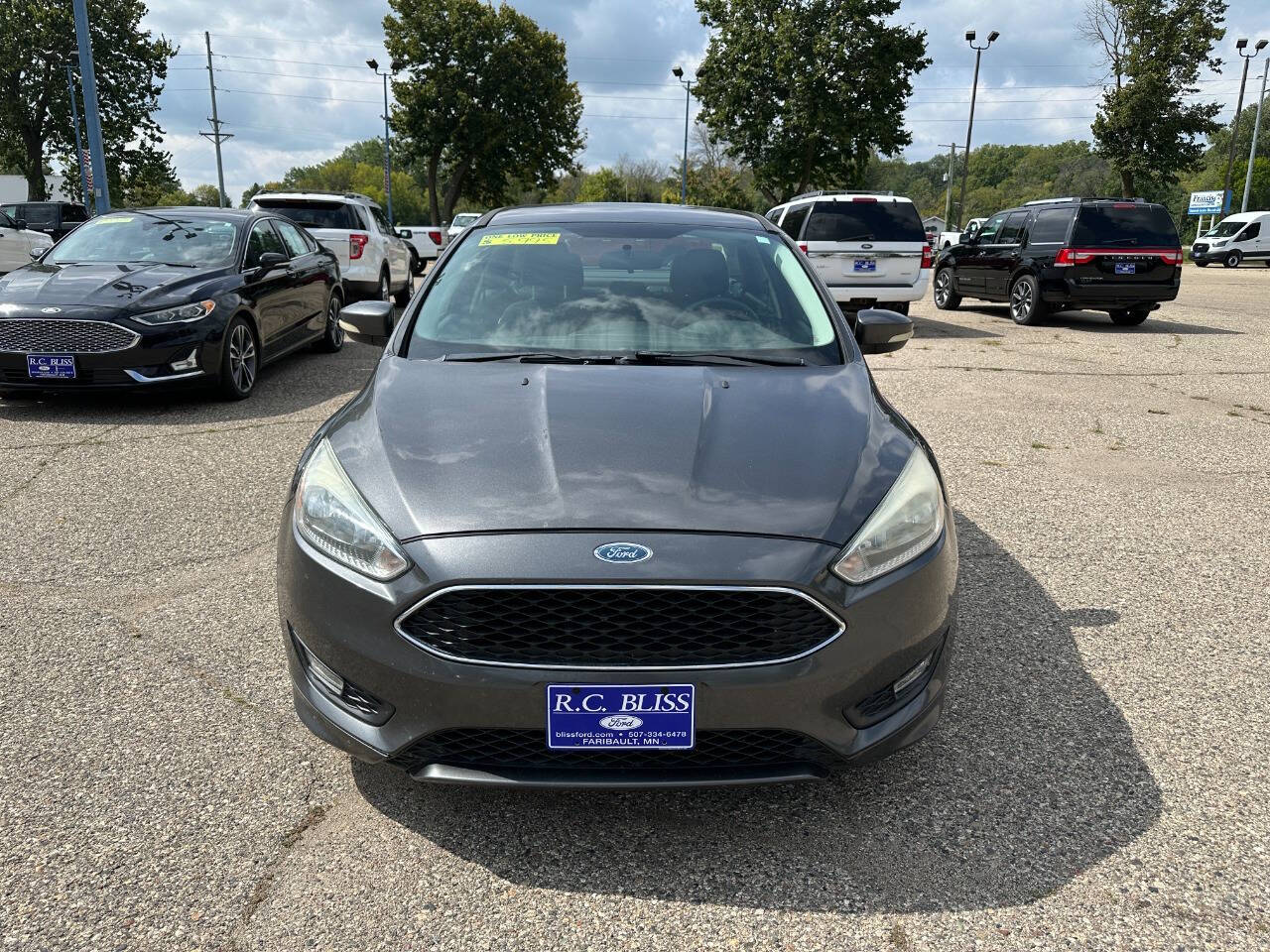 Used 2015 Ford Focus SE with VIN 1FADP3F28FL249098 for sale in Faribault, Minnesota