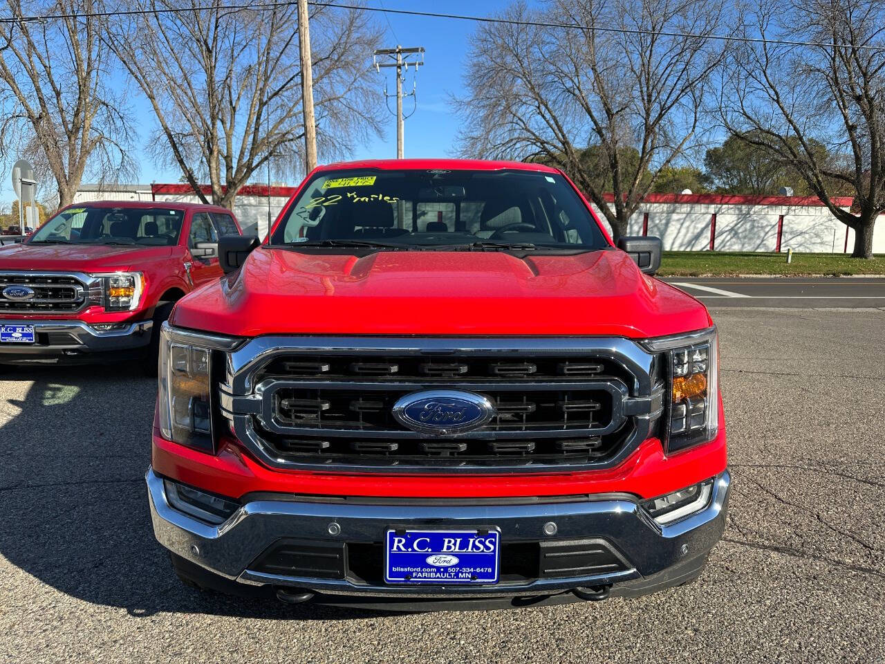 Used 2022 Ford F-150 XLT with VIN 1FTFW1E55NKD68415 for sale in Faribault, Minnesota