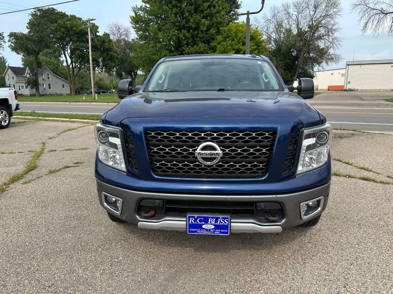 Used 2017 Nissan Titan PRO-4X with VIN 1N6AA1E53HN521043 for sale in Faribault, Minnesota
