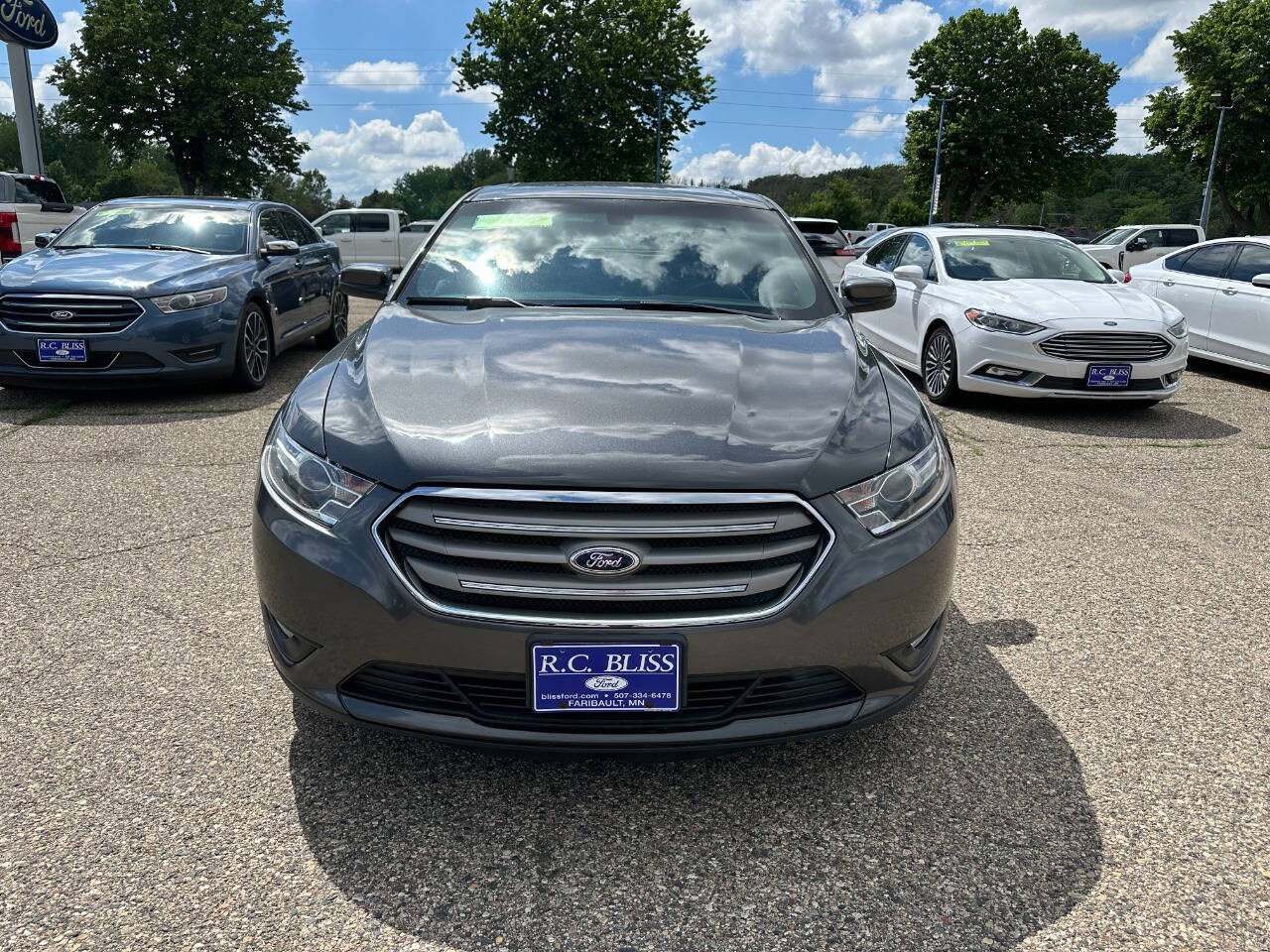 Used 2016 Ford Taurus SEL with VIN 1FAHP2E88GG115705 for sale in Faribault, Minnesota