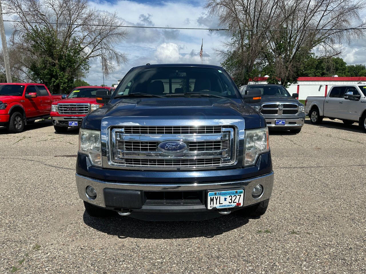 Used 2014 Ford F-150 XLT with VIN 1FTFW1ET7EKF25456 for sale in Faribault, Minnesota