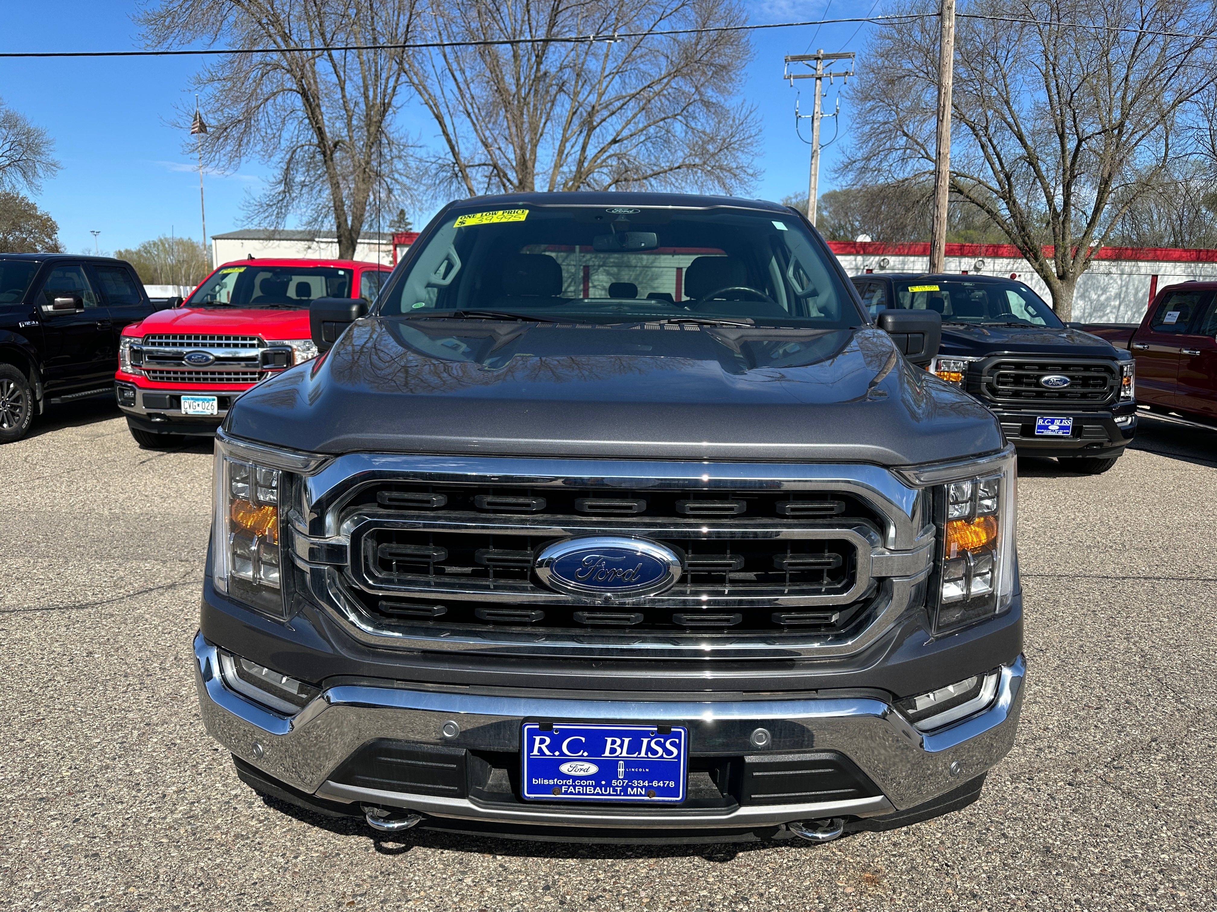 Used 2021 Ford F-150 XLT with VIN 1FTFW1E83MFB28443 for sale in Faribault, Minnesota