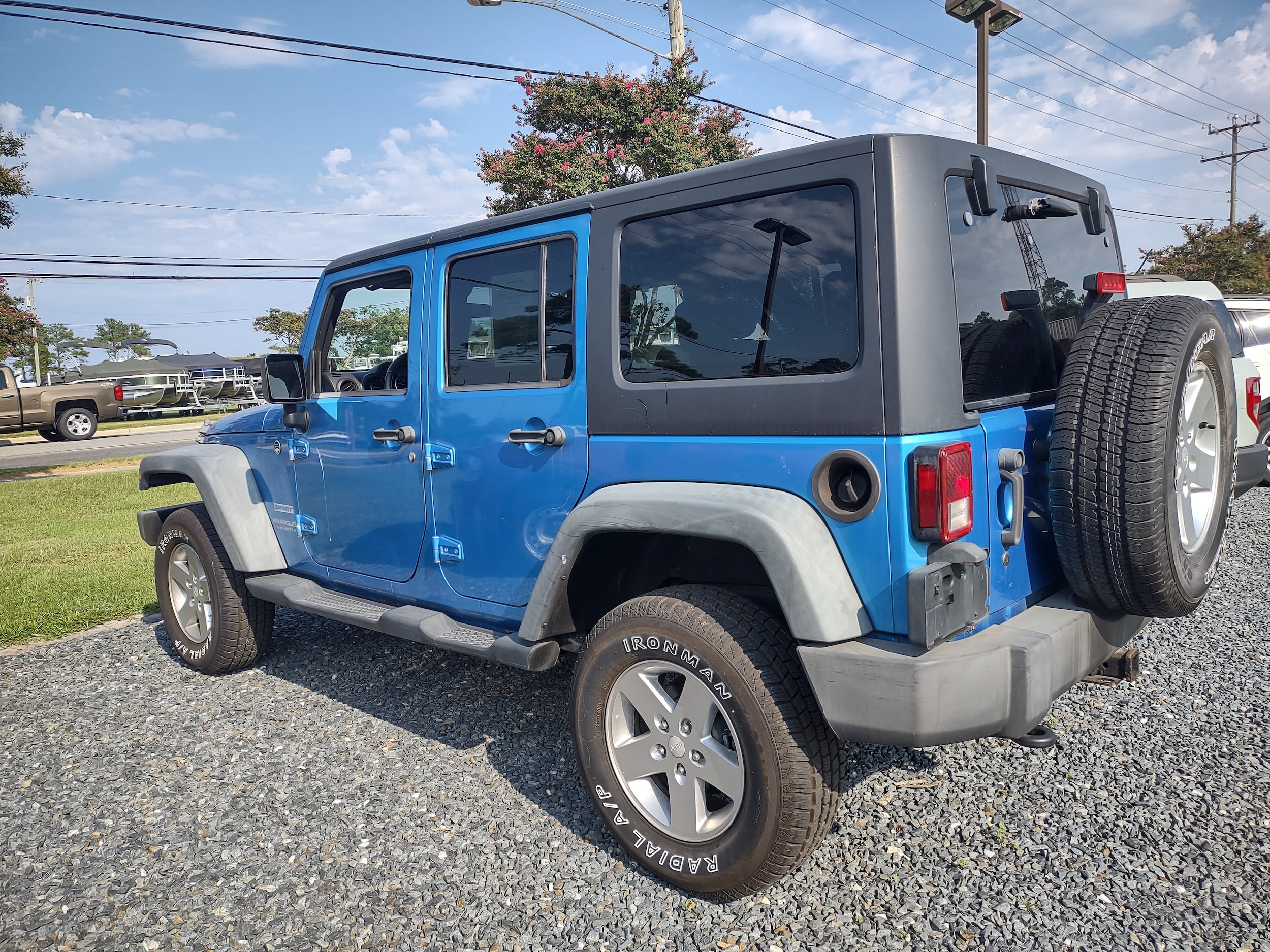 Used 2010 Jeep Wrangler Unlimited Sport with VIN 1J4BA3H15AL177058 for sale in Manteo, NC