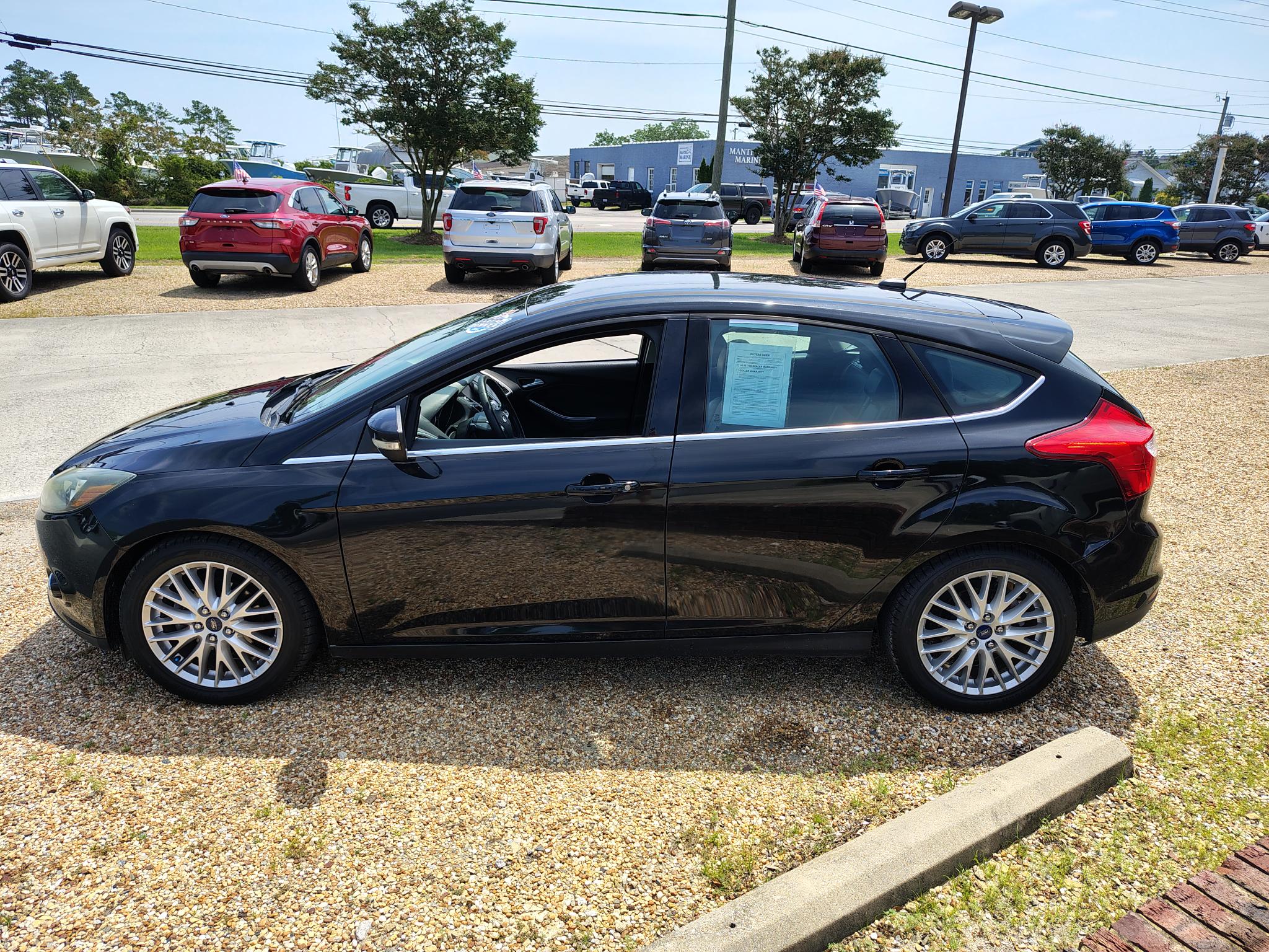 Used 2014 Ford Focus Titanium with VIN 1FADP3N25EL298484 for sale in Manteo, NC